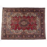 Red ground rug Hamadan, with central foliate medallion within a blue foliate borderCondition report: