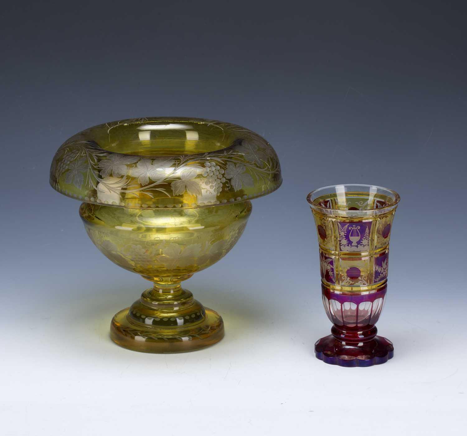 Two pieces of Bohemian glass one a flashed glass vase with red, yellow and clear glass colouring,