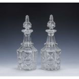 Pair of cut glass decanters 19th Century, with shaped stoppers and cut bases, unmarked, 33cm high