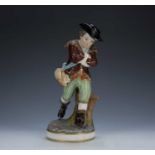 Derby porcelain model of a skater mark used circa 1820, the standing figure with arms crossed, 23.