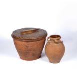 Terracotta planter with a later wooden lid, the planter excluding the lid measures 20cm high x
