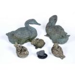 Collection of garden ornaments consisting of two cast metal models of ducks, unmarked, 36cm wide