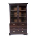 Mahogany glazed top bookcase 18th Century, the top section with glazed doors over two short and