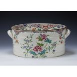 Oval Spode pottery two handled foot bath circa 1830, with transfer design of peonies, impressed mark