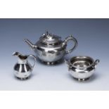 Three-piece Scottish Victorian silver bachelors tea set consisting of a teapot, milk/cream jug and a