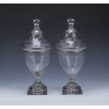 Pair of cut glass sweetmeat jars and covers 19th Century, each with fluted decoration, etched swags,