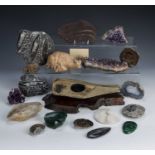 Collection of specimens to include fossils, amethyst, carved frogs, malachite etcCondition report: