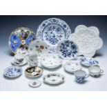 Collection of Meissen porcelain consisting of a white moulded porcelain floral shaped plate with