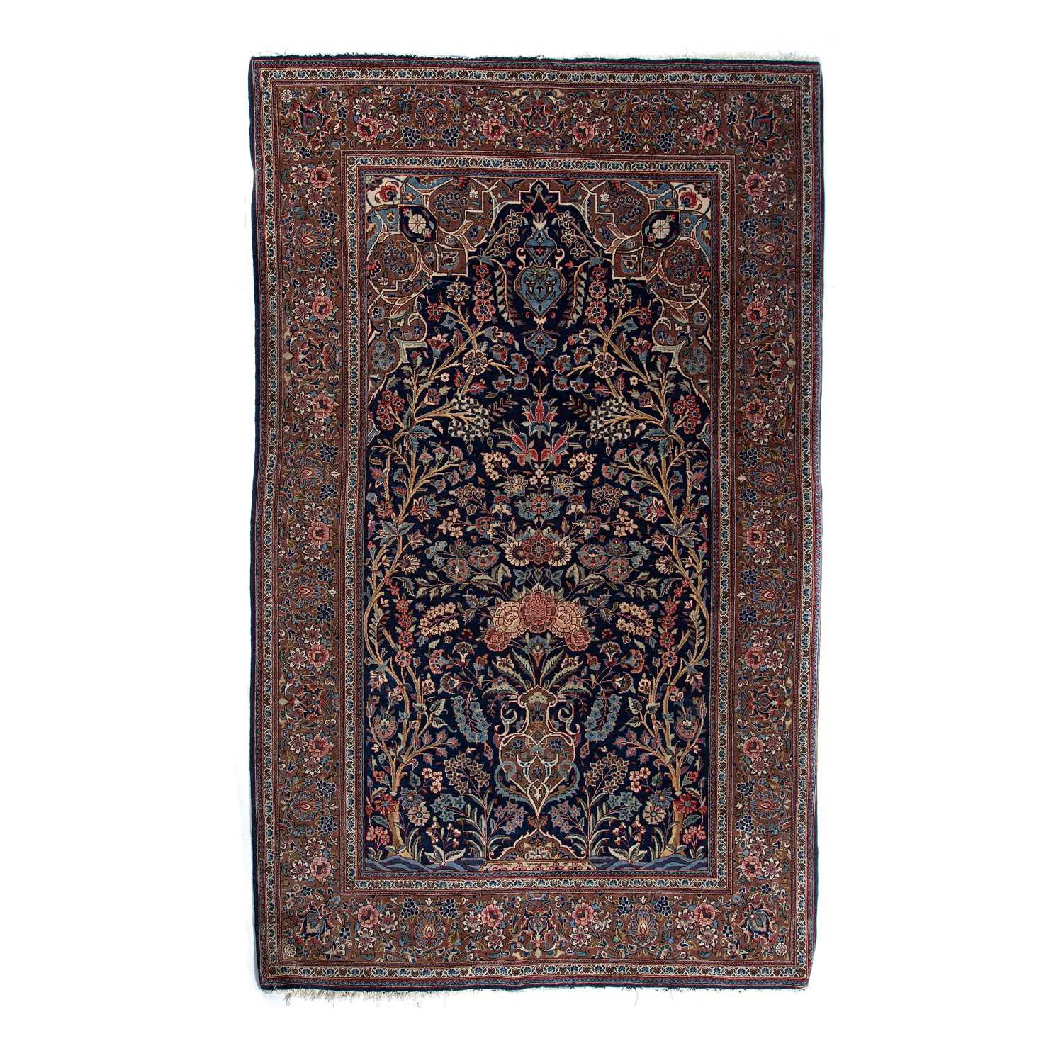 Kashan rug of blue ground, with a tree of life design within a foliate border, 220cm x
