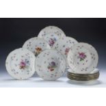 Set of twelve Meissen porcelain shallow bowls German, each individually painted with flower sprays
