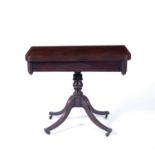 Mahogany tea table 19th Century, on turned quadrapartite base terminating in brass castors, 91cm x