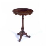 Walnut tripod table 19th Century, with circular top and shaped frieze, 50cm x 72cmCondition