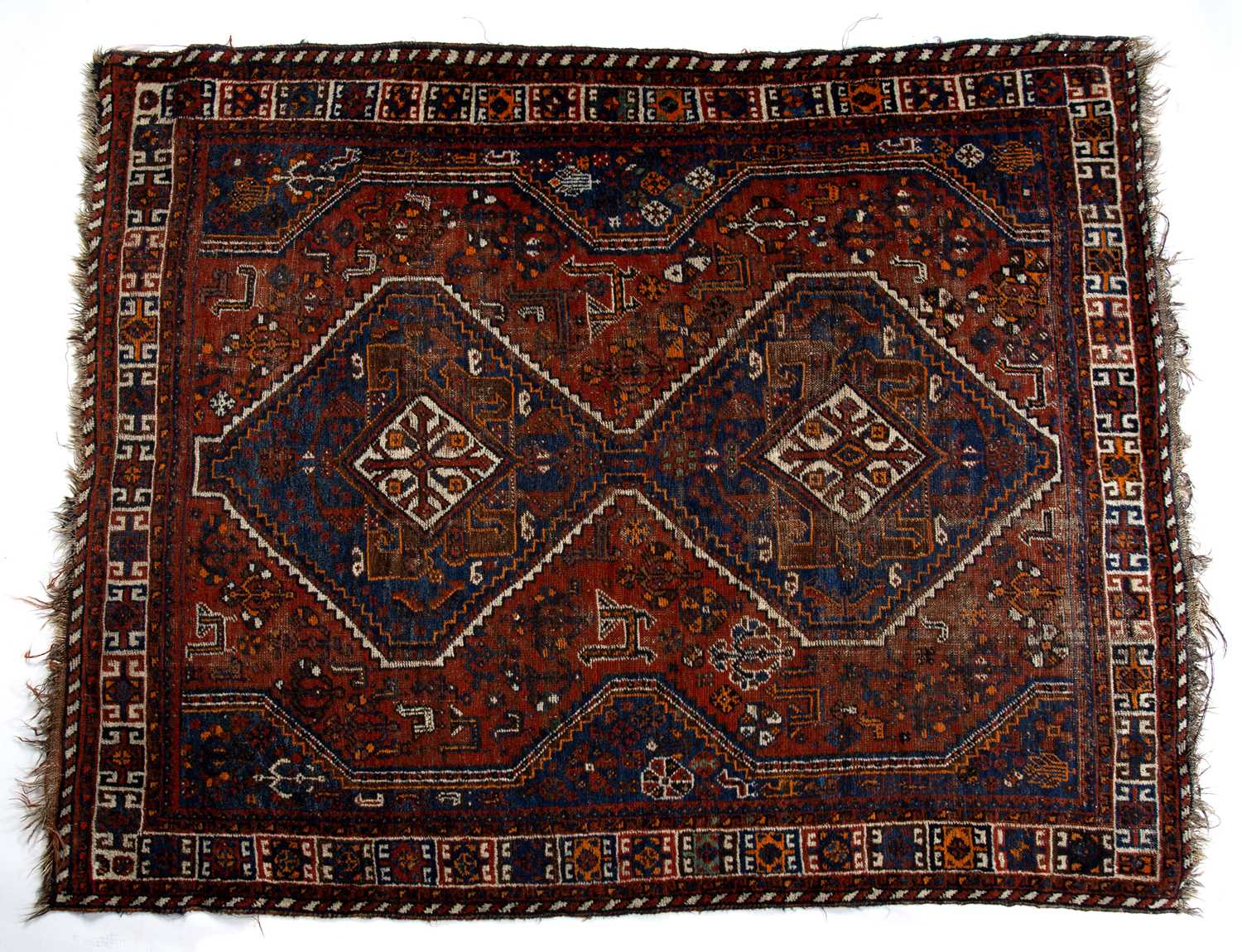 Red ground rug Hamadan, with two central medallions and stylised geometric border, 203cm x