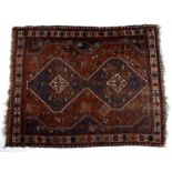 Red ground rug Hamadan, with two central medallions and stylised geometric border, 203cm x