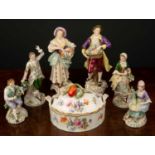 Six continental porcelain figurines the largest 22cm in height together with a continental porcelain