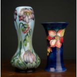 A mid-twentieth century Moorcroft Clematis vase by Walter Moorcroft, signed and stamped to the base,