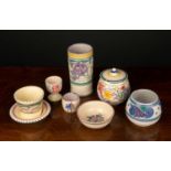 A small collection of 1920's and 1930's Poole Pottery comprising a vase marked TR to the base,