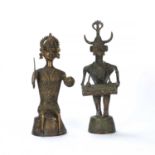 Two cast metal Hindu sculptures of the Dhokra Damar, West Bengal, one figure with a horned helmet