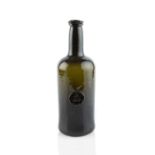 A sealed wine bottle, cylinder, seal stamped J Colby Fynone (John Colby, Pembroke), 26cm high