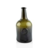 A sealed and dated wine bottle, squat cylinder, seal stamped N Pearse 1783, 24cm high