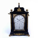 James Green, London: An 18th century ebonised bracket clock, the signed silvered dial with strike/