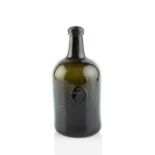 A sealed wine bottle, squat cylinder, seal stamped J.S. Short Hatherleigh (Seal pad too small for