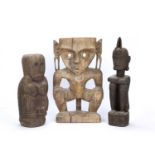 Tribal interest, Dayak Hampatong Borneo carved wooden figure, the standing male figure with hands to