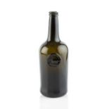 A sealed wine bottle, cylinder, seal stamped with a boar, 27.5cm high
