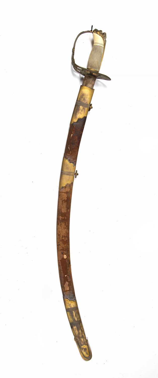 A 19th century Officer's dress sword, the gilt brass hilt with textured ivory grip, lion mask