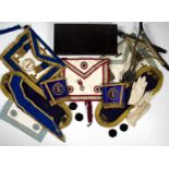 A collection of Masonic regalia, comprising epaulettes, apron etc for the Berkshire Lodge, in tin