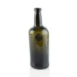 A sealed wine bottle, cylinder, seal stamped J.O., 25.5cm high