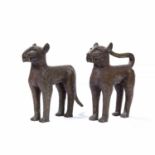 A large pair of African, Benin leopards, patinated bronze with engraved circular design, one with