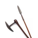 An African Zulu, wood and iron spear, with hide leather attachment to top, 131cm long and a Zulu
