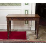 A mid Victorian mahogany side table, with two frieze drawers, on turned and lobed legs and