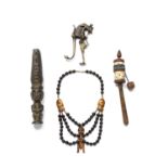 Tribal interest, a collection of small items which include an African beaded necklace, Tibetan