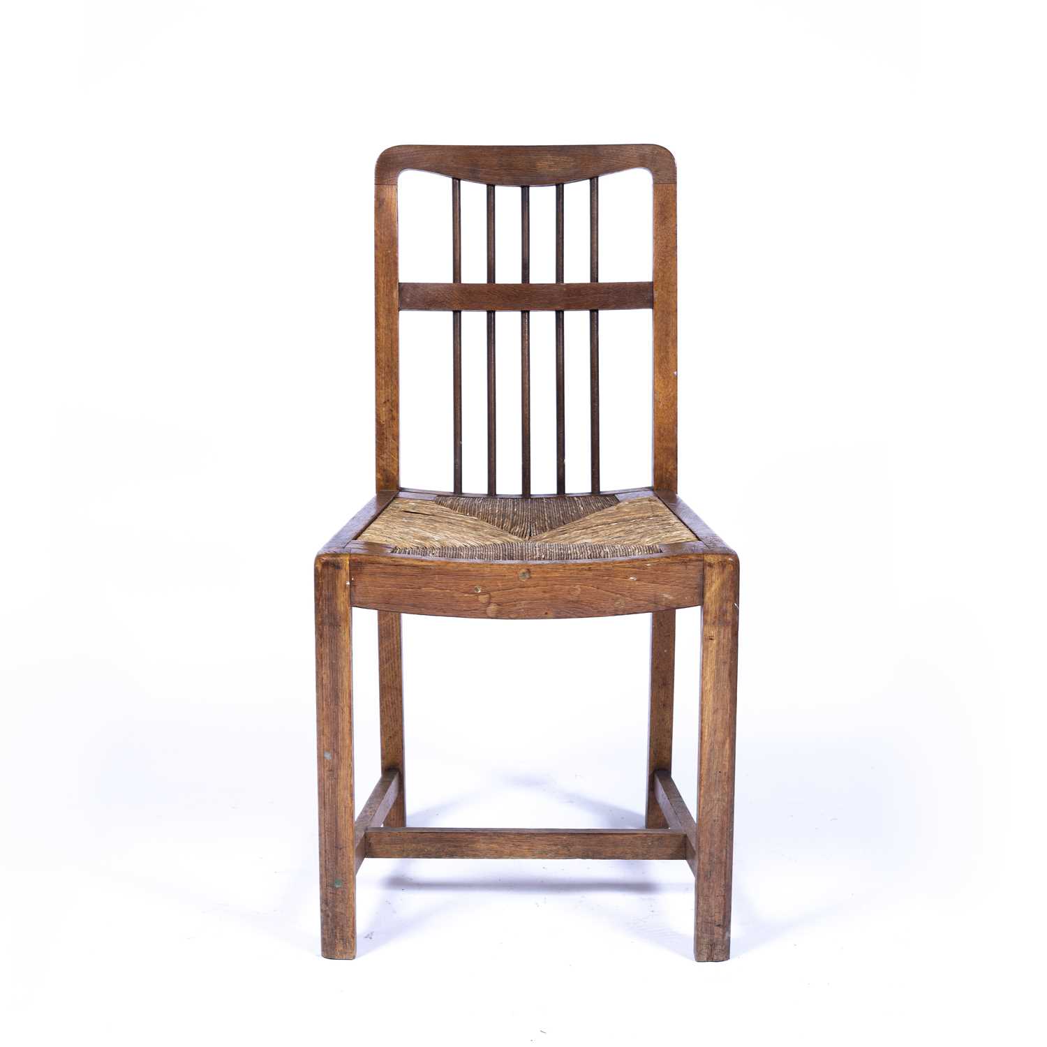 Arts & Crafts oak framed chair with spindle back and drop-in raffia seat, unmarked, 85cm