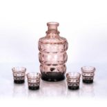 Art Deco pink and black, cut glass decanter and four glasses, decanter is 19cm high (5)Condition