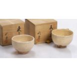 20th Century Japanese School (Tohraku of Kyoto) near pair of studio pottery raku tea bowls, with