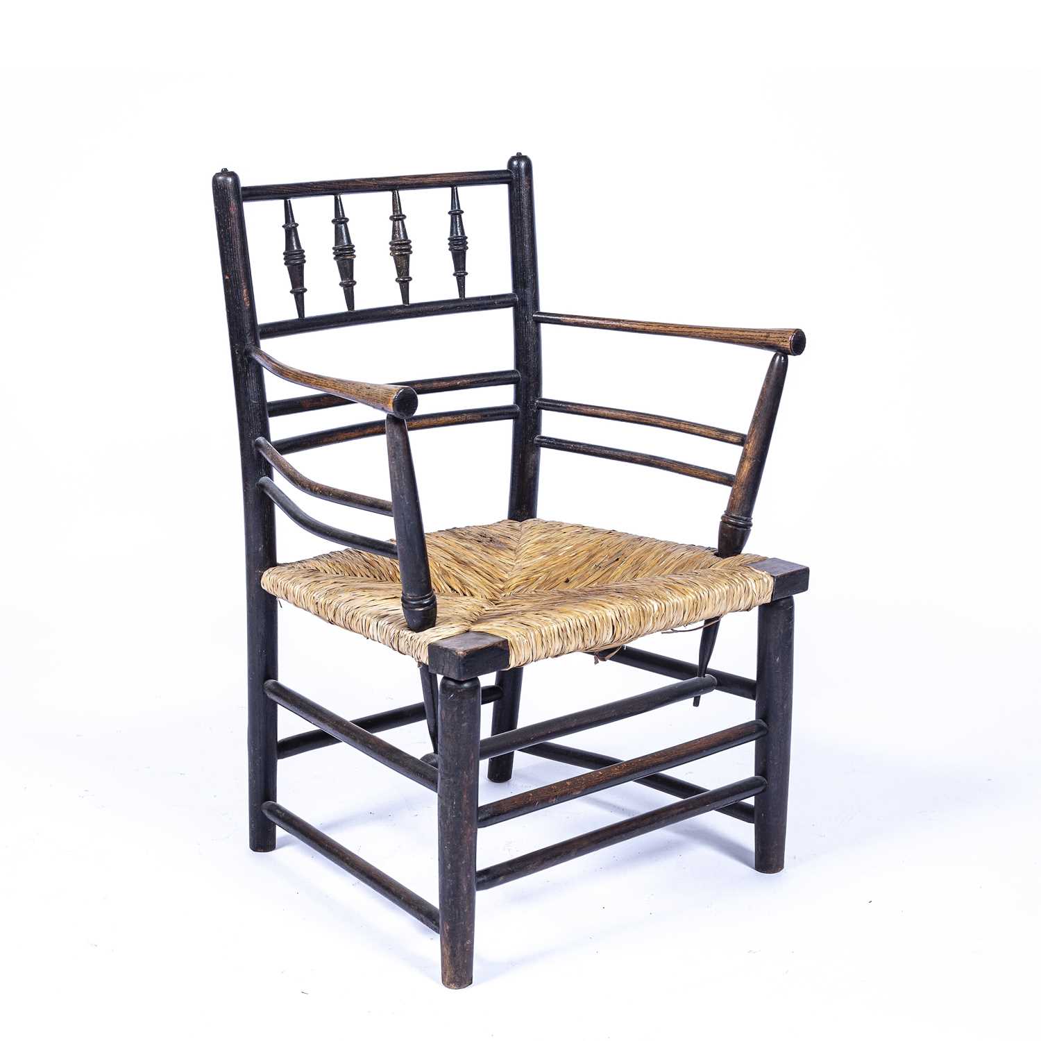 In the manner of Morris & Co 'Sussex' chair, ebonised with rush seat, unmarked, 74cm high - Image 2 of 4