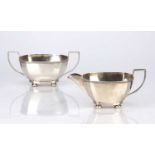 George V silver sucrier and matching jug with angular trophy handles, bearing marks for S