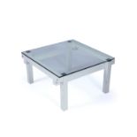 John Makepeace (b.1939) Coffee table, circa 1970, the white painted frame with glass top, 35cm high,