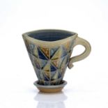 Andrew Osborne (Contemporary) saltglazed teacup (flattened form), unmarked, 18cm highCondition