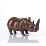 In the manner of Laszlo Hoenig (1905-1971) Carved wooden rhino, unmarked, 15cm acrossCondition