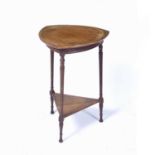 Art Nouveau oak occasional table with triangular top having carved decoration with triangular