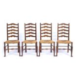 Heals set of four dining chairs, with raffia seats, 102cm high (4) Literature: Heals dining room and