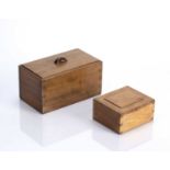 In the manner of Peter Waals (1870-1937) Cotswold School, two oak boxes: one with a hinged lid,