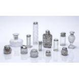 Collection of silver mounted and cut glass dressing table requisites scent bottles and a silver