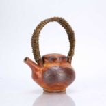 Lisa Hammond (b.1956) at Maze Hill Pottery soda glazed teapot, with woven handle, impressed