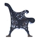 Aesthetic Movement Pair of black painted cast iron bench ends, decorated with flowers, stars and