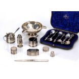 Collection of silver items consisting of: napkin rings, pedestal dish/ashtray, thimble,